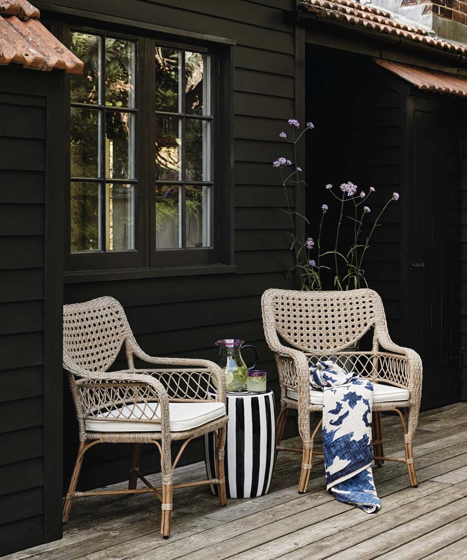 6. Tuck a bistro set beneath a window for a romantic seating spot