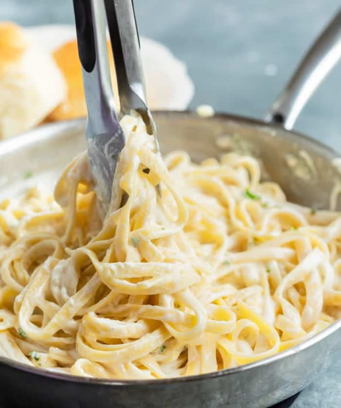 The perfect copycat Alfredo sauce made in just 20 minutes.<p><strong>Get the Recipe: <a href="https://thecozycook.com/olive-garden-alfredo-sauce/" rel="sponsored" target="_blank" data-ylk="slk:Copycat Olive Garden Alfredo Sauce;elm:context_link;itc:0;sec:content-canvas" class="link ">Copycat Olive Garden Alfredo Sauce</a></strong></p>