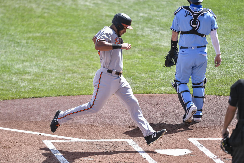 Baltimore Orioles' Anthony Santander scores against the Toronto Blue Jays on a single by José Iglesias during the first inning of a baseball game in Buffalo, N.Y., Monday, Aug. 31, 2020. (AP Photo/Adrian Kraus)