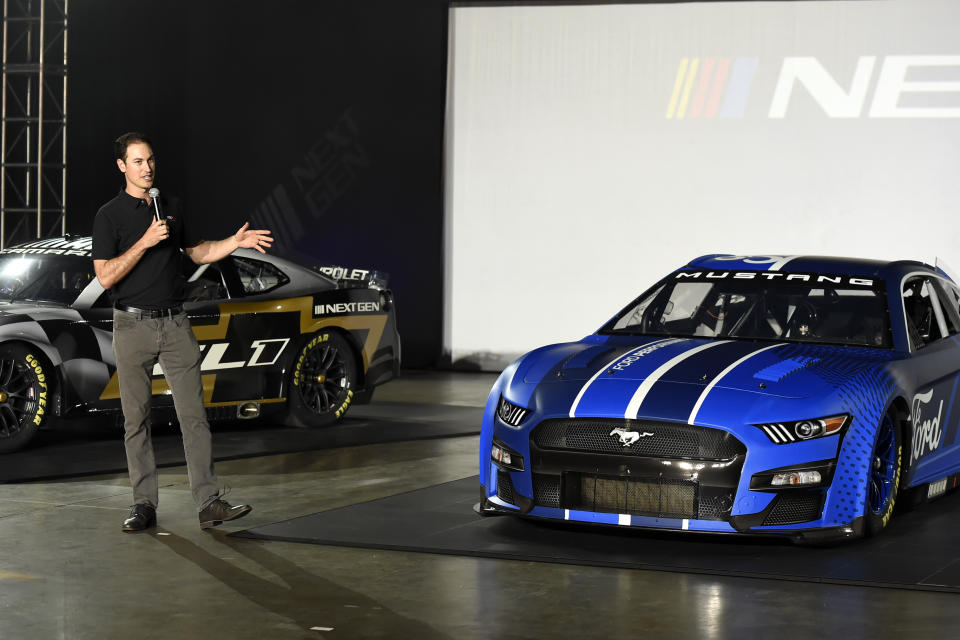 FILE Driver Joey Lagano talks about the Next Gen Mustang Cup car that will be used starting in the 2022 season during a NASCAR media event in Charlotte, N.C., Wednesday, May 5, 2021. The overdue Next Gen car has at last arrived following a one-year pandemic delay. The spec car is a collaboration between all of NASCAR's stakeholders and that includes the drivers. (AP Photo/Mike McCarn, File)