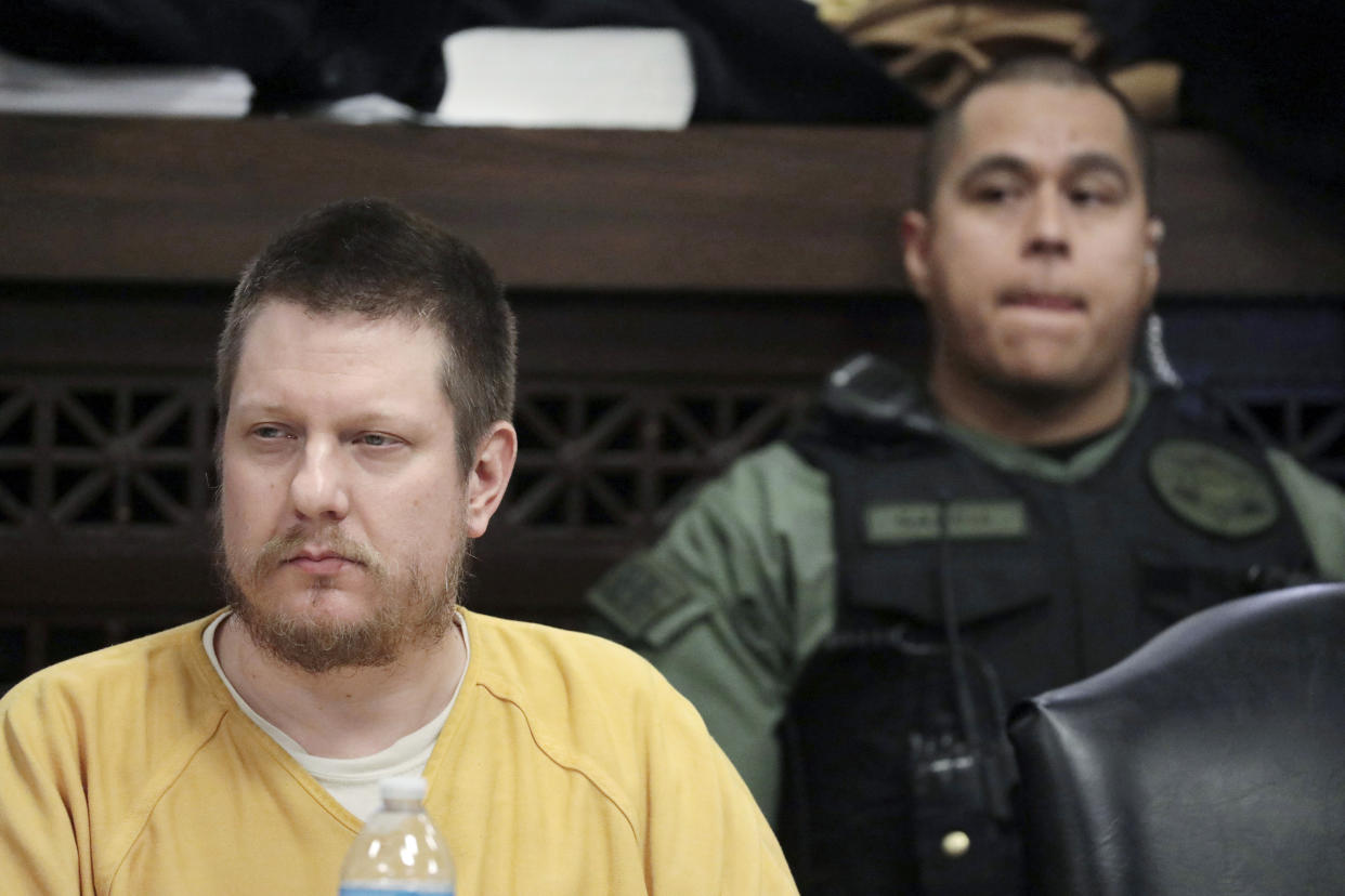 Chicago police Officer Jason Van Dyke, left, attends his sentencing hearing at the Leighton Criminal Court Building in Chicago, for the 2014 shooting of Laquan McDonald, Jan. 18, 2019. (Chicago Tribune via AP)