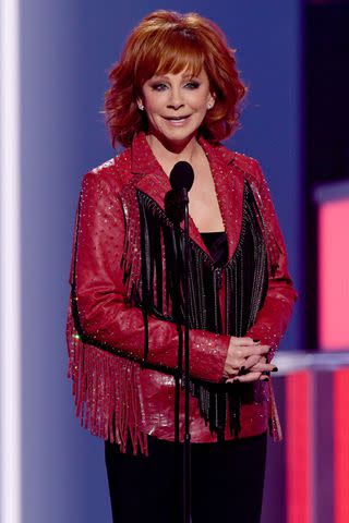 <p>Kevin Winter/Getty</p> Reba McEntire at the 2019 ACM Awards.