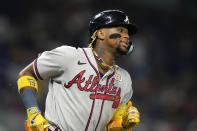 Atlanta Braves' Ronald Acuna Jr. runs after hitting a single during the first inning of a baseball game against the Miami Marlins, Friday, Sept. 15, 2023, in Miami. (AP Photo/Lynne Sladky)