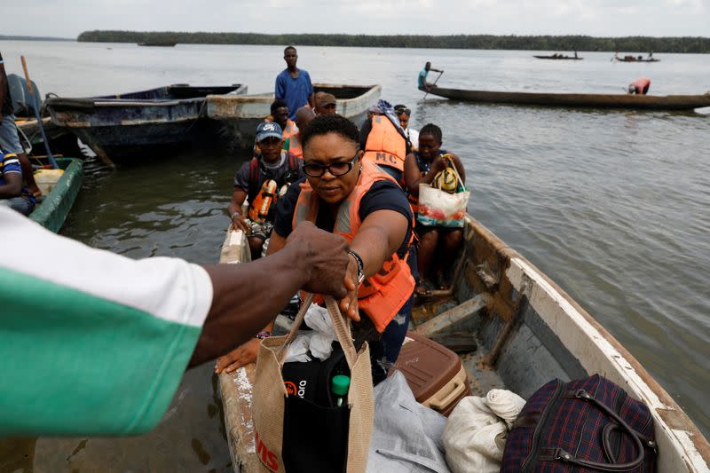 The Wider Image: Nigeria's female bouncers show their strength fighting stereotypes