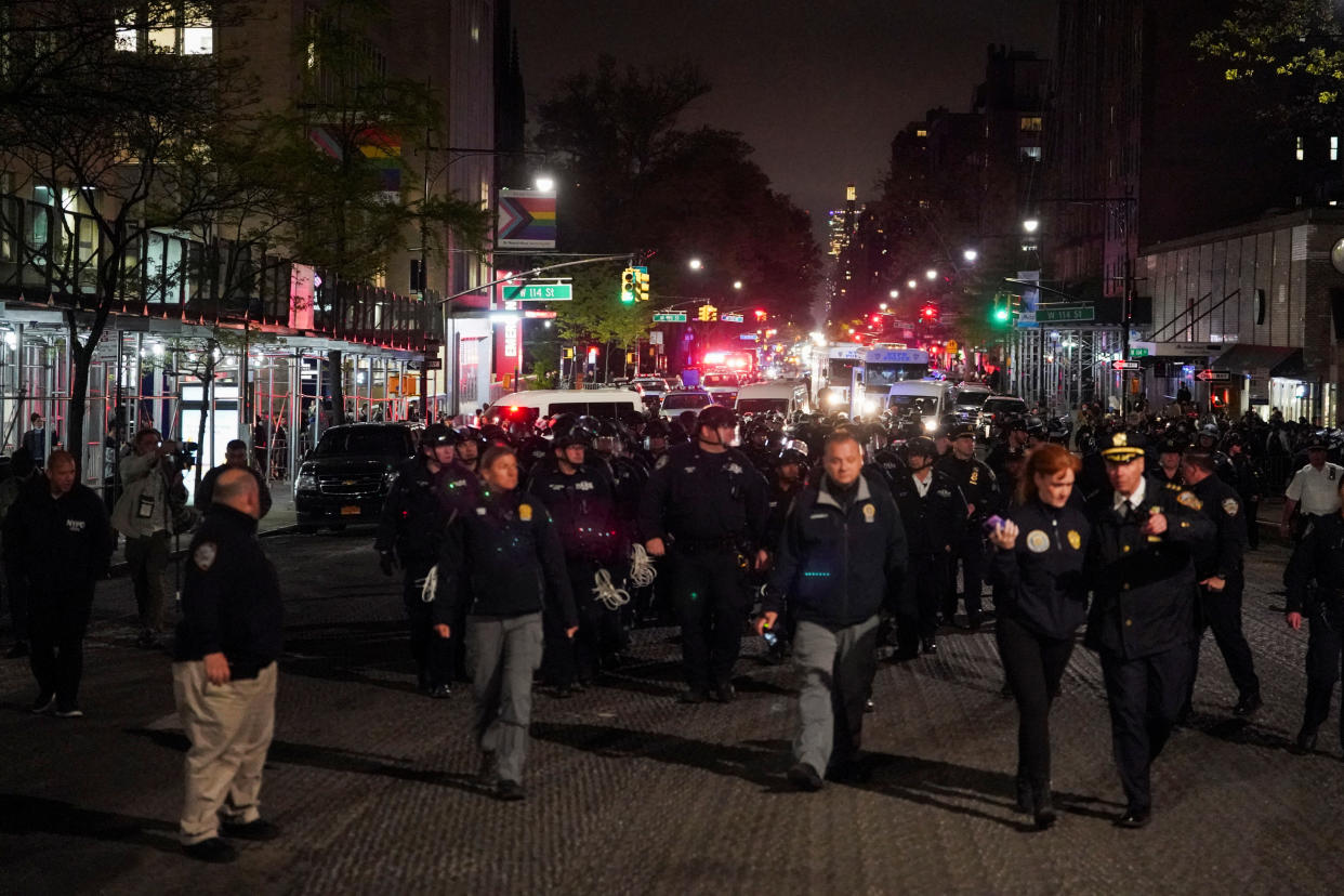 Police walk near Columbia University. 