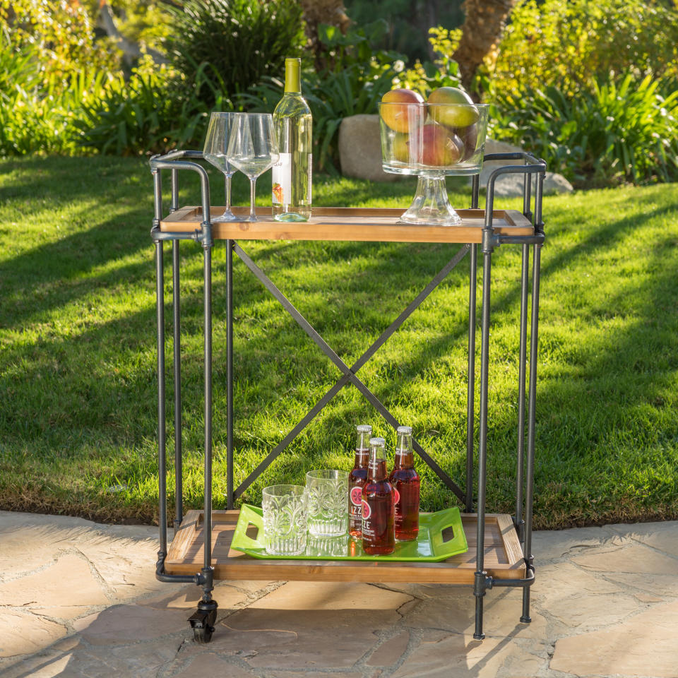 Noble House Maraka Outdoor Antique Finish Firwood and Iron Bar Cart (Photo: Walmart)