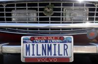 Irv Gordon's Volvo P1800 displays the license plate "MILNMILR" in Babylon, N.Y., Monday, July 2, 2012. Gordon's car already holds the world record for the highest recorded milage on a car and he is less than 40,000 miles away from passing three million miles on the Volvo. (AP Photo/Seth Wenig)