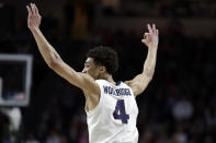 Gonzaga's Ryan Woolridge reacts after scoring a three-point basket during the first half of an NCAA college basketball game against San Francisco in the West Coast Conference men's tournament Monday, March 9, 2020, in Las Vegas. (AP Photo/Isaac Brekken)