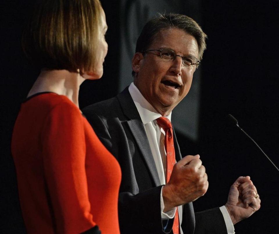 North Carolina Gov. Pat McCrory, with his wife Ann at his side, speaks to supporters at a Republican Party election results event at the Crabtree Marriott in Raleigh, N.C., on Tuesday, Nov. 8, 2016.