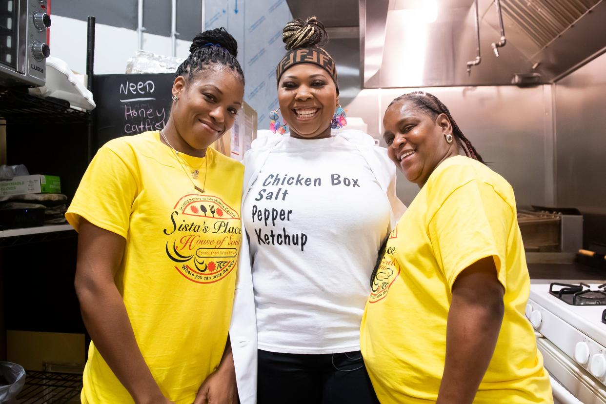 Kim Eppes-Bostic (center) poses for a photo with her cousins, Desa Whitley (left) and Shona Jones, in the kitchen of her Hanover eatery, Sista's Place Soul Food, on Wednesday, Oct. 20, 2021. Whitley and Jones help out with the day-to-day operations of the business in any way they can.