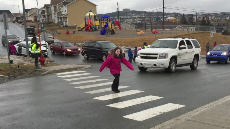 Paradise parents hit streets over crosswalk safety at Holy Family School