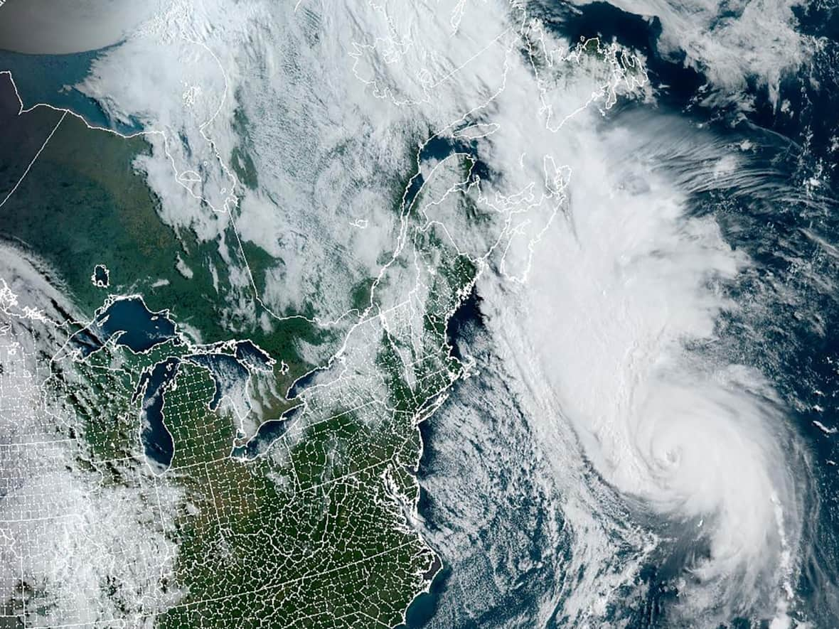 Hurricane Fiona advances towards Canada's Maritimes provinces in a composite image from the National Oceanic and Atmospheric Administration (NOAA) GOES-East weather satellite on Sept. 23, 2022. (NOAA/Reuters - image credit)