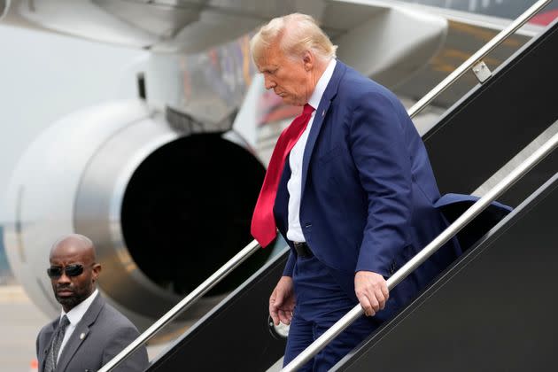 Former President Donald Trump arrives at Ronald Reagan Washington National Airport in Arlington County, Virginia.