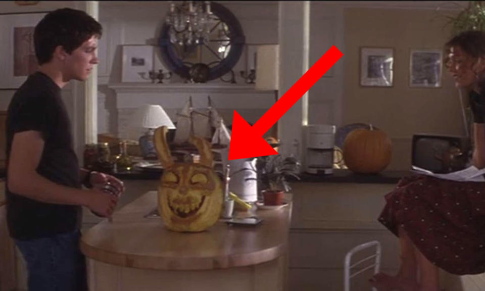 <p>In Richard Kelly’s cult time travel mind-trip a pumpkin carved like Frank’s creepy rabbit mask can be seen on the Darko’s breakfast table. It’s never referenced. </p>