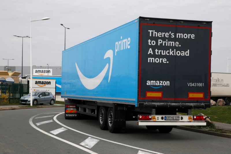 A truck with the logo of Amazon Prime Delivery arrives at the Amazon logistics center in Lauwin-Planque