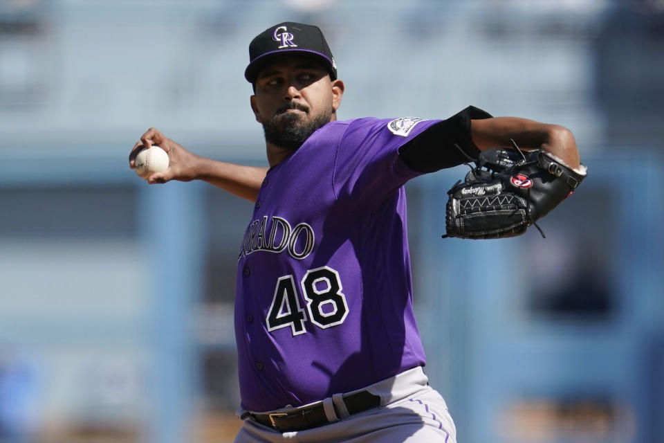 Colorado Rockies starting pitcher German Marquez throws to a Los Angeles Dodgers batter during the first inning of a baseball game, Sunday, Oct. 2, 2022, in Los Angeles. (AP Photo/Marcio Jose Sanchez)