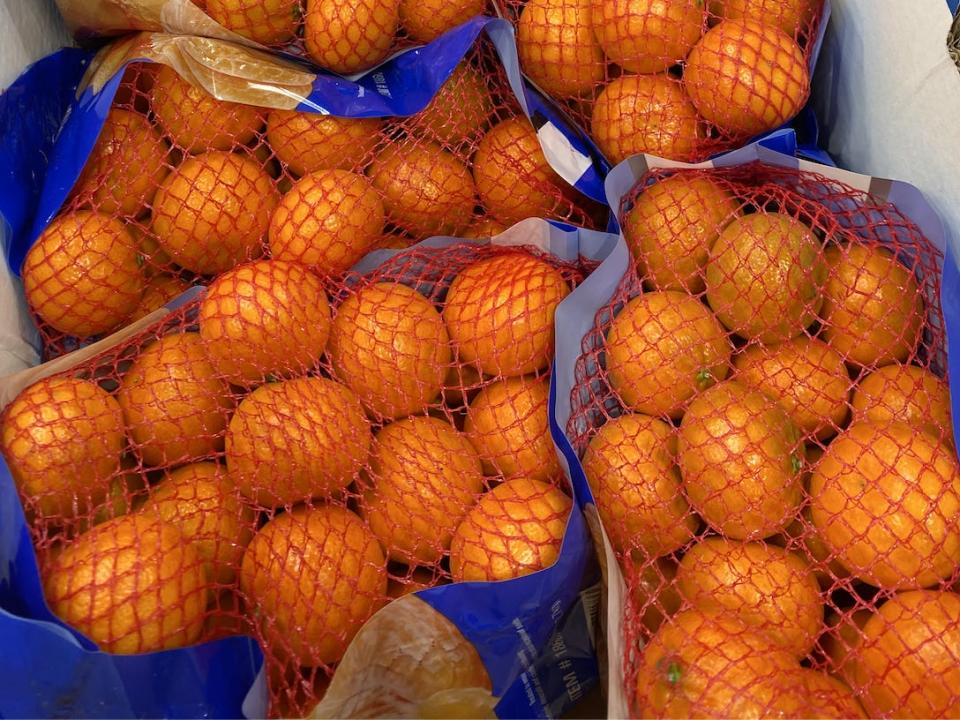 Large bags of clementines in box at Costco