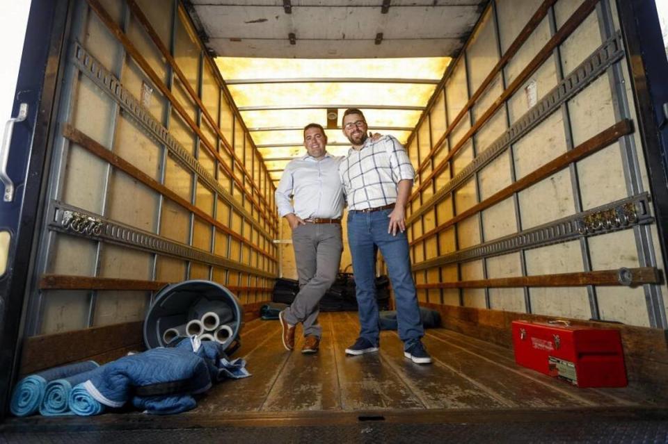 Aaron, left, and Evan Steed founded Meathead Movers. Joe Johnston/jjohnston@thetribunenews.com