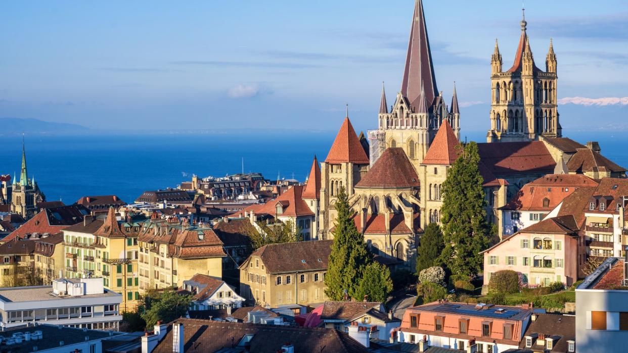  The Swiss city of Lausanne overlooking Lake Geneva  . 