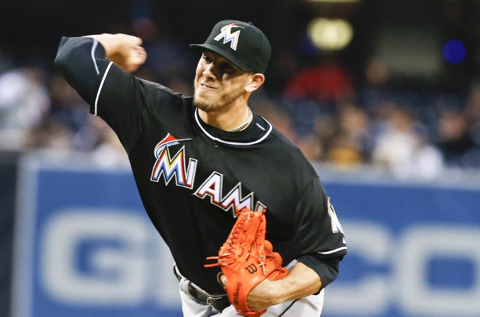 Miami Marlins starting pitcher Jose Fernandez works the first inning against the San Diego Padres during a baseball game on Friday, May 9, 2014, in San Diego. (AP Photo/Lenny Ignelzi)
