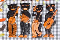 <p>This jazzy quartet features light embossing—a sure sign of their age—these cool cats bring in about $100 each. Reproductions of this 1940s design, which the company continues to make today, can be identified by their double-sided printing and a lack of embossing.</p>