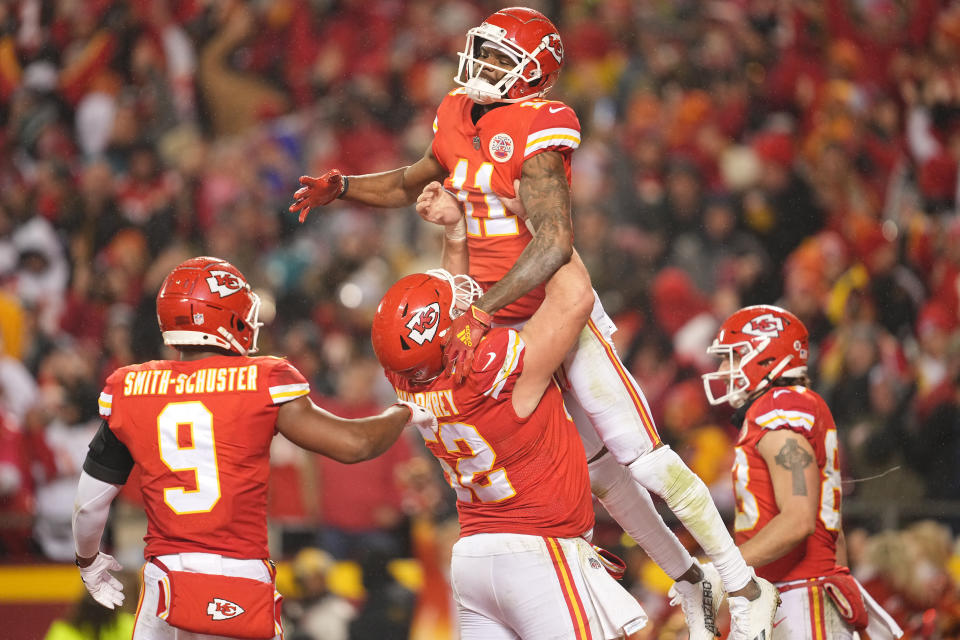 Jan 21, 2023; Kansas City, Missouri, USA; Kansas City Chiefs wide receiver Marquez Valdes-Scantling (11) celebrates his touchdown scored against the <a class="link " href="https://sports.yahoo.com/nfl/teams/jacksonville/" data-i13n="sec:content-canvas;subsec:anchor_text;elm:context_link" data-ylk="slk:Jacksonville Jaguars;sec:content-canvas;subsec:anchor_text;elm:context_link;itc:0">Jacksonville Jaguars</a> with guard <a class="link " href="https://sports.yahoo.com/nfl/players/29312" data-i13n="sec:content-canvas;subsec:anchor_text;elm:context_link" data-ylk="slk:Joe Thuney;sec:content-canvas;subsec:anchor_text;elm:context_link;itc:0">Joe Thuney</a> (62) during the second half in the AFC divisional round game at GEHA Field at Arrowhead Stadium. Mandatory Credit: Jay Biggerstaff-USA TODAY Sports