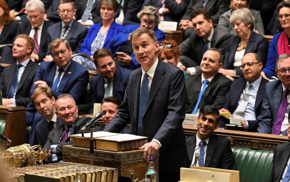 Britain's Chancellor of the Exchequer Jeremy Hunt gives Autumn Statement at the House of Commons in London, Britain, November 22