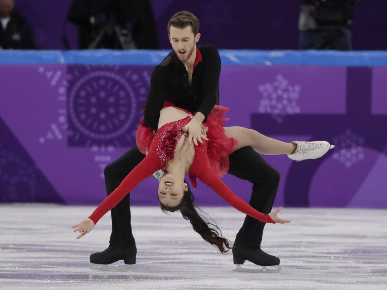 Yura Min experienced a wardrobe malfunction during her routine on Sunday. (AP Photo/Julie Jacobson)