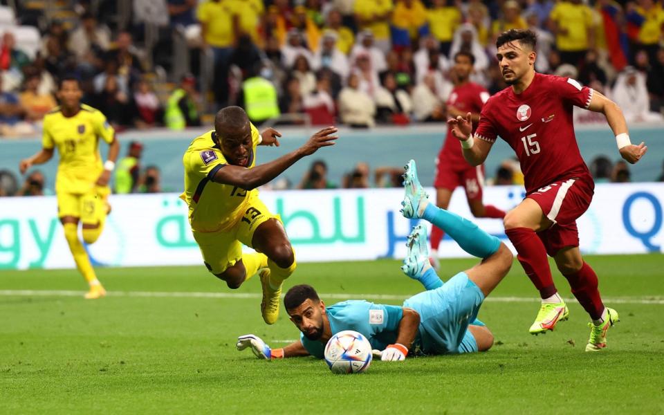 Qatar's Saad Al-Sheeb concedes a penalty against Enner Valencia - REUTERS/Kai Pfaffenbach