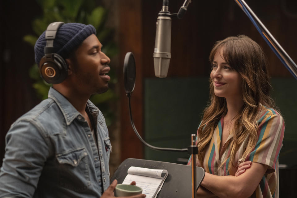 This image released by Focus Features shows Kelvin Harrison Jr., left, and Dakota Johnson in a scene from "The High Note." (Glen Wilson/Focus Features via AP)