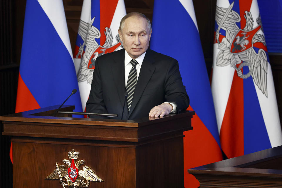 Russian President Vladimir Putin addresses an extended meeting of the Russian Defense Ministry Board at the National Defense Control Center in Moscow, Russia, Tuesday, Dec. 21, 2021. (Mikhail Tereshchenko, Sputnik, Kremlin Pool Photo via AP)