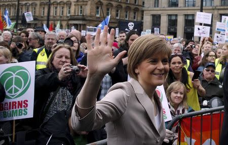 Nicola Sturgeon, the leader of the Scottish National Party, waves after speaking at a CND Scotland anti-trident rally in Glasgow, Scotland, April 4, 2015. REUTERS/Russell Cheyne