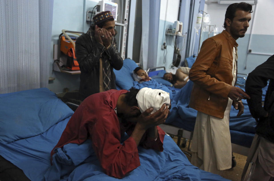 An injured men receive treatment at a hospital after a suicide bombing in Kabul, Afghanistan, Nov. 20, 2018. Afghan officials said the suicide bomber targeted a gathering of Muslim religious scholars in Kabul, killing tens of people. A Public Health Ministry spokesman said another 60 people were wounded in the attack, which took place as Muslims around the world marked the birthday of the Prophet Mohammad. (AP Photo/Rahmat Gul)