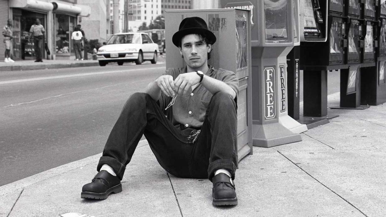  Jeff Buckley sitting on a street corner in Atlanta, Georgia, in 1994 