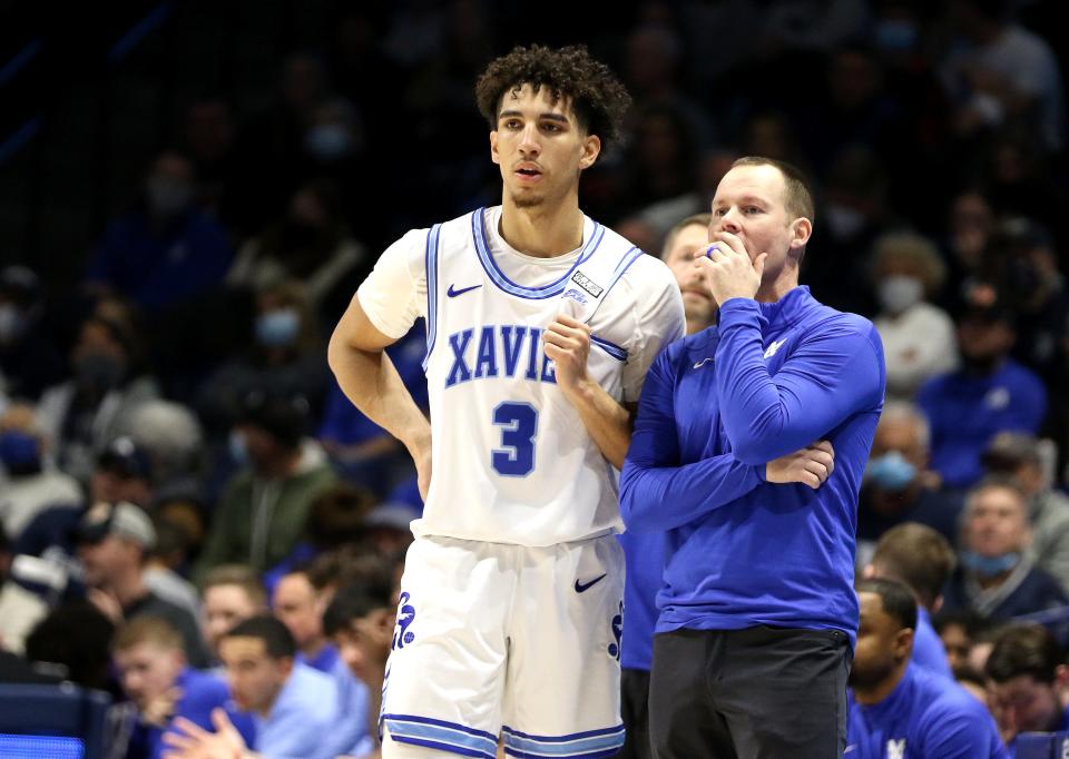 Xavier Musketeers guard Colby Jones (3) talks with head coach Travis Steele during the first half Saturday, January 15, 2022 at the Cintas Center. 