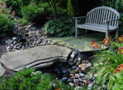 <body><p>The rich, natural, and varied color of river rock makes it a popular landscaping stone. Because it comes in a variety of river sizes and colors, it can be used in almost any style of planting bed and <a rel="nofollow noopener" href=" http://www.bobvila.com/iron-scroll-edging/5408-landscape-edging-10-easy-ways-to-set-your-garden-beds-apart/slideshows#.VD2GQ_ldWSo?bv=yahoo" target="_blank" data-ylk="slk:edging;elm:context_link;itc:0;sec:content-canvas" class="link ">edging</a>, or mixed with other materials in pathways and patios. For something off the beaten path, create a meandering dry stream bed like this one in your own backyard.</p></body>