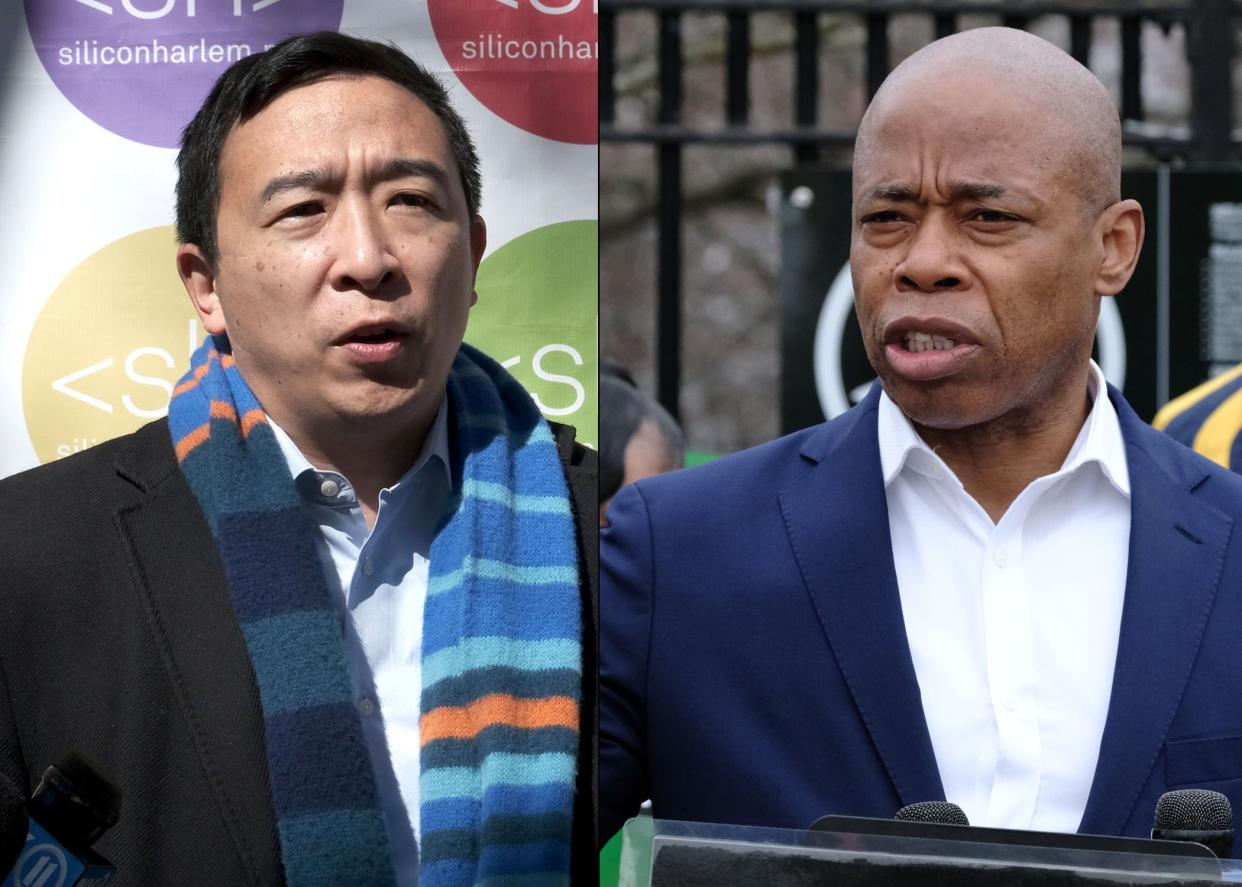 New York City Democratic mayoral candidates Andrew Yang (left) and Eric Adams (right)