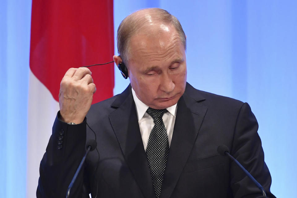 Russia's President Vladimir Putin attends a press conference with Japan's Prime Minister Shinzo Abe after the G-20 summit in Osaka, western Japan Saturday, June 29, 2019. (Yuri Kadobnov/Pool Photo via AP)