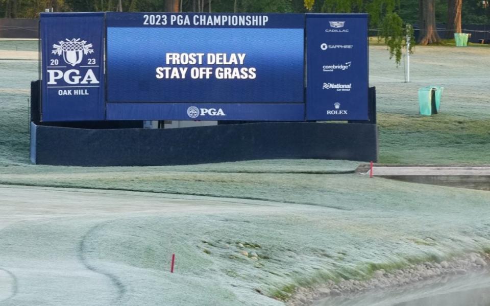 A frost delay warning displays on a video board on the sixth hole before the first round of the PGA Championship at Oak Hill Country Club on Thursday, May 18, 2023 - Getty Images/Darren Carroll