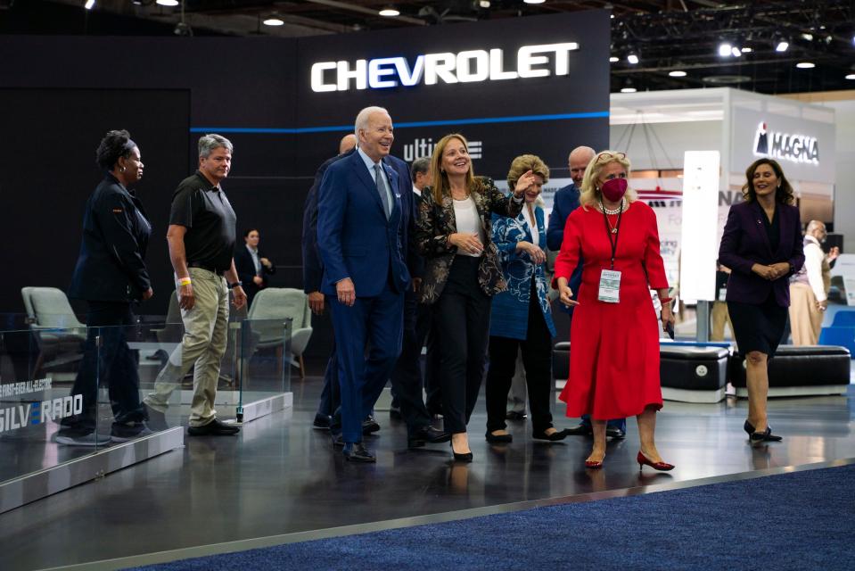 President Joe Biden is given a tour by General Motors CEO Mary Barra flanked by local officials at the 2022 North American International Auto Show held at Huntington Place in downtown Detroit on Wednesday, Sept. 14, 2022