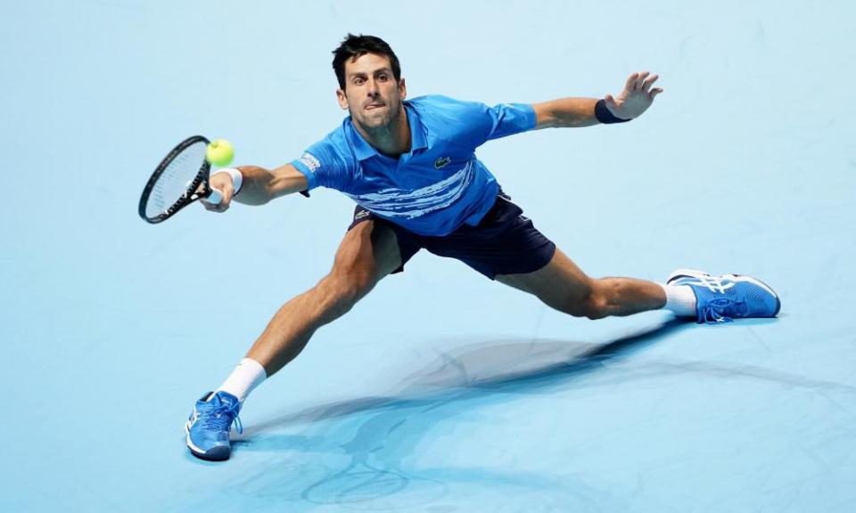 Novak Djokovic executes a trademark hardcourt slide