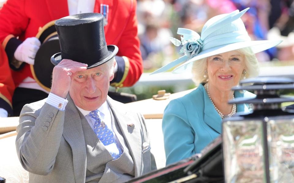 The Prince of Wales and the Duchess of Cornwall in the traditional carriage procession on the first day of Royal Ascot - Chris Jackson