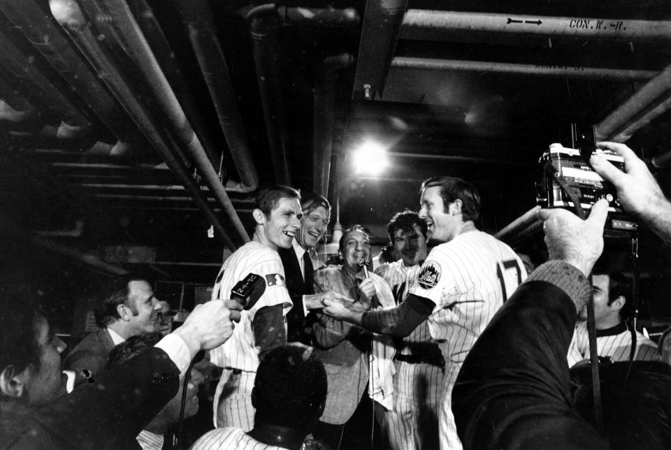 CORRECTS THAT HARRELSON DIED EARLY THURSDAY, JAN. 11, NOT WEDNESDAY NIGHT, JAN. 10, AS ORIGINALLY SENT -FILE - New York City Mayor John Lindsay is drenched with champagne as he celebrates with the New York Mets their World Series victory over the Baltimore Orioles in dressing room at New York's Shea Stadium, Thursday, Oct. 16, 1969. Standing from left are, Bud Harrelson; Mayor Lindsay; annnouncer Lindsay Nelson, center; Ron Swoboda (4); and Rod Gasper (17). Bud Harrelson, the scrappy and sure-handed shortstop who fought Pete Rose on the field during a playoff game and helped the New York Mets win an astonishing championship, died early Thursday, Jan. 11, 2024. He was 79. The Mets said Thursday morning that Harrelson died at a hospice house in East Northport, New York after a long battle with Alzheimer's.(AP Photo, File)