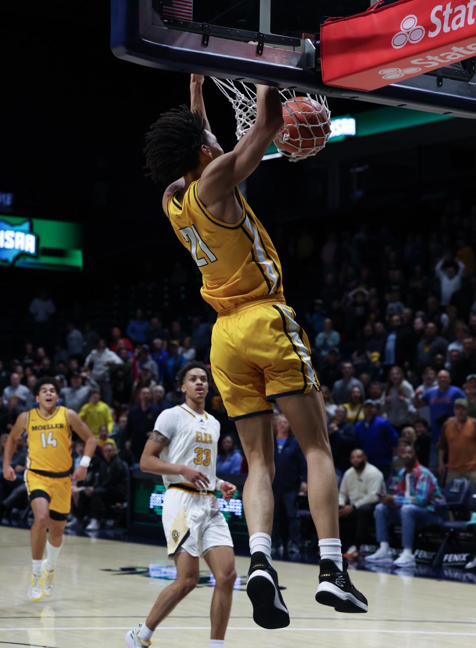 Alex Kazanecki of Moeller on this dunk gives them a 63-57 lead with 1:36 left in the first overtime. Moeller played Centerville in a Division I regional final. Centerville won in double overtime 70-69.