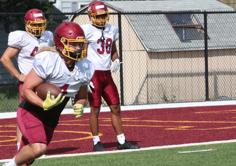 Northern State University running back Brett Brenton works through a drill last week during a football practice. He's the Wolves top returning rusher after accumulating 545 yards and five touchdowns last season. Northern opens the season at 6 tonight against Upper Iowa at Dacotah Bank Stadium.