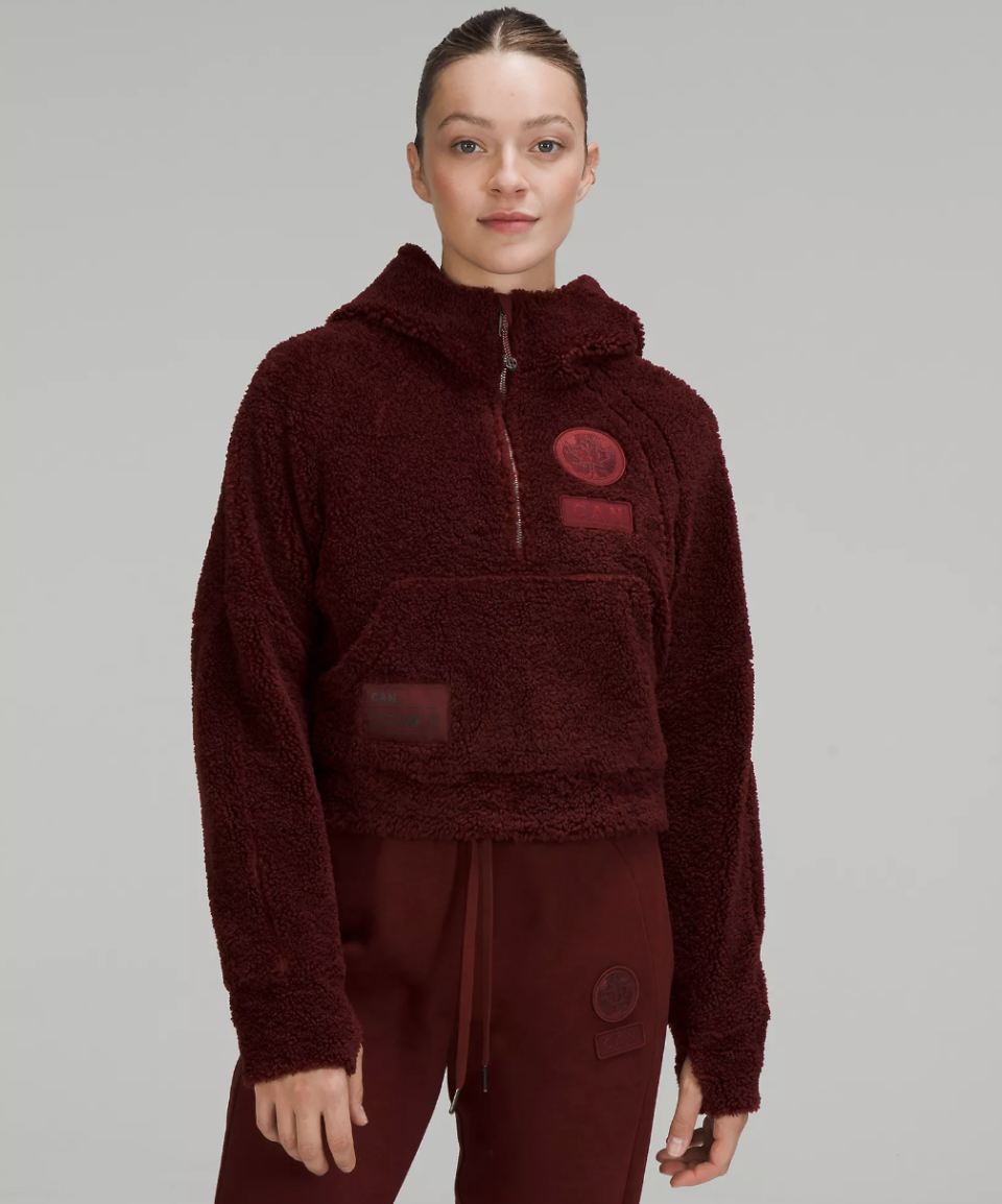 Team Canada Scuba Oversized Half-Zip Fleece Hoodie in red merlot (Photo via Lululemon)