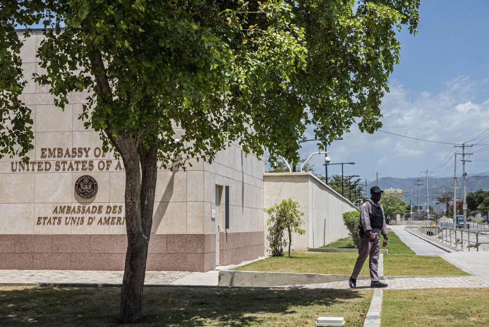 Security awaits the arrival of an unidentified Haitian diplomatic delegation at the U.S. Embassy in Port-au-Prince July 11, 2021, three days after the assassination of Haitian leader Jovenel Moise. / Credit: Valerie Baeriswyl/AFP via Getty Images