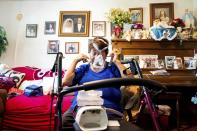 Environmental activist Maria Arevalo, 74, demonstrates the air machine she uses to treat sleep apnea on Monday, May 20, 2024, in Pixley, Calif. Arevalo said she believes her asthma and sleep apnea are linked to pollution from numerous dairies near her home. (AP Photo/Noah Berger)