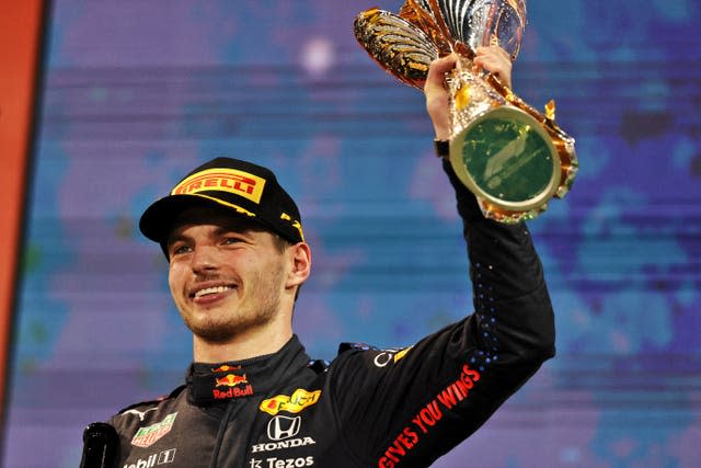 Max Verstappen celebrates taking the title in Abu Dhabi 