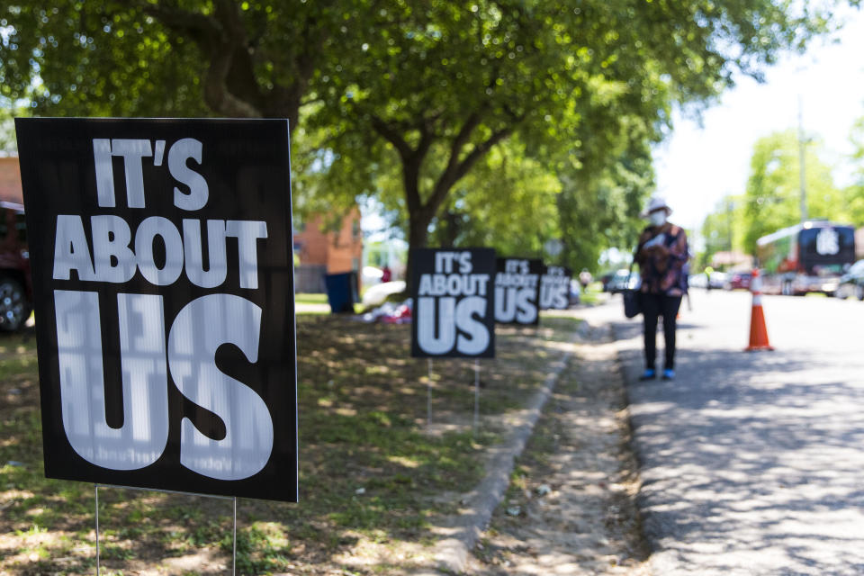 Signs supporting Black Voters Matter dot the road at Brown Chapel A.M.E. Church for the John Lewis Advancement Act Day of Action, a voter education and engagement event, Saturday, May 8, 2021, in Selma, Ala. (AP Photo/Vasha Hunt)